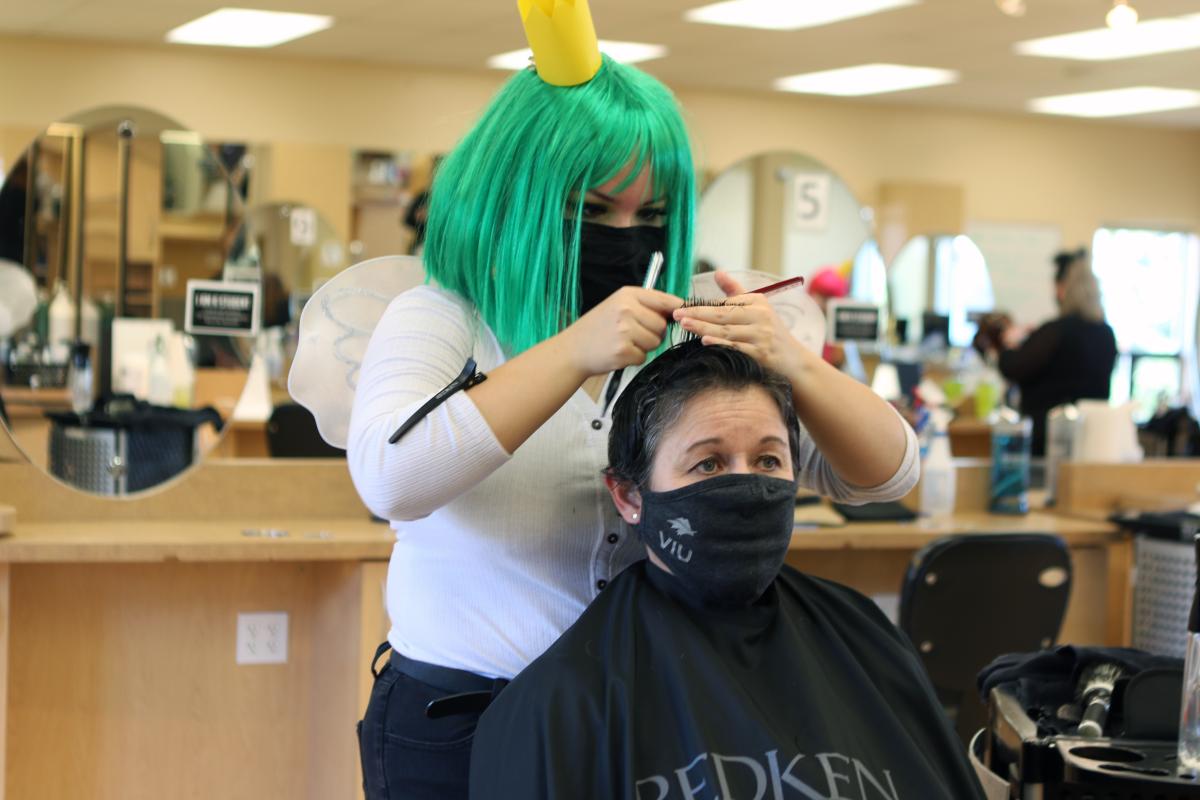 Deb Saucier gets a haircut at the VIU Salon